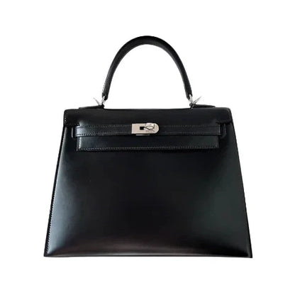 Bolso estructurado de mano con solapa
