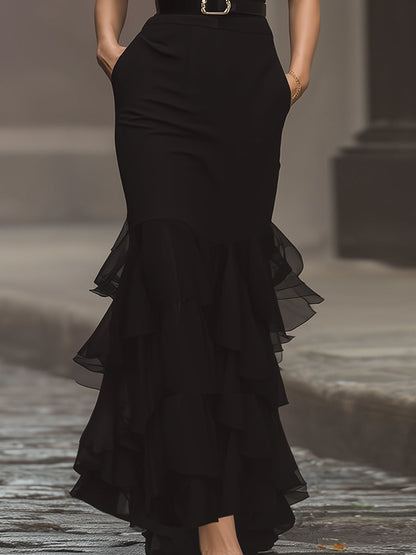 Vestido largo sin mangas con cinturón