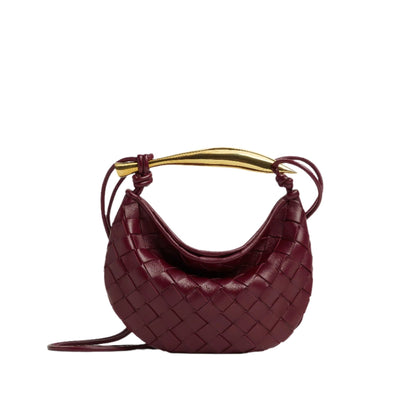 Bolso compacto trenzado con asa rígida
