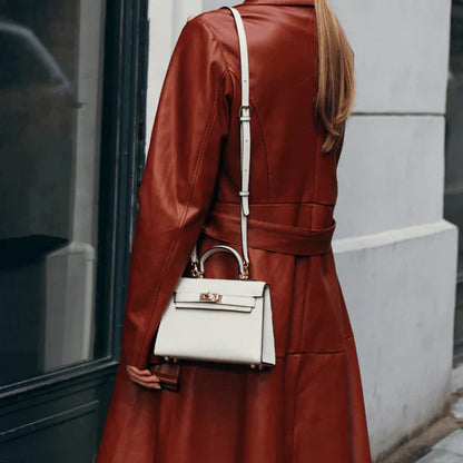 Bolso estructurado de mano con solapa