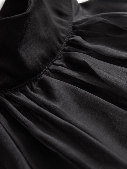Blusa sin mangas de gasa con detalle plisado