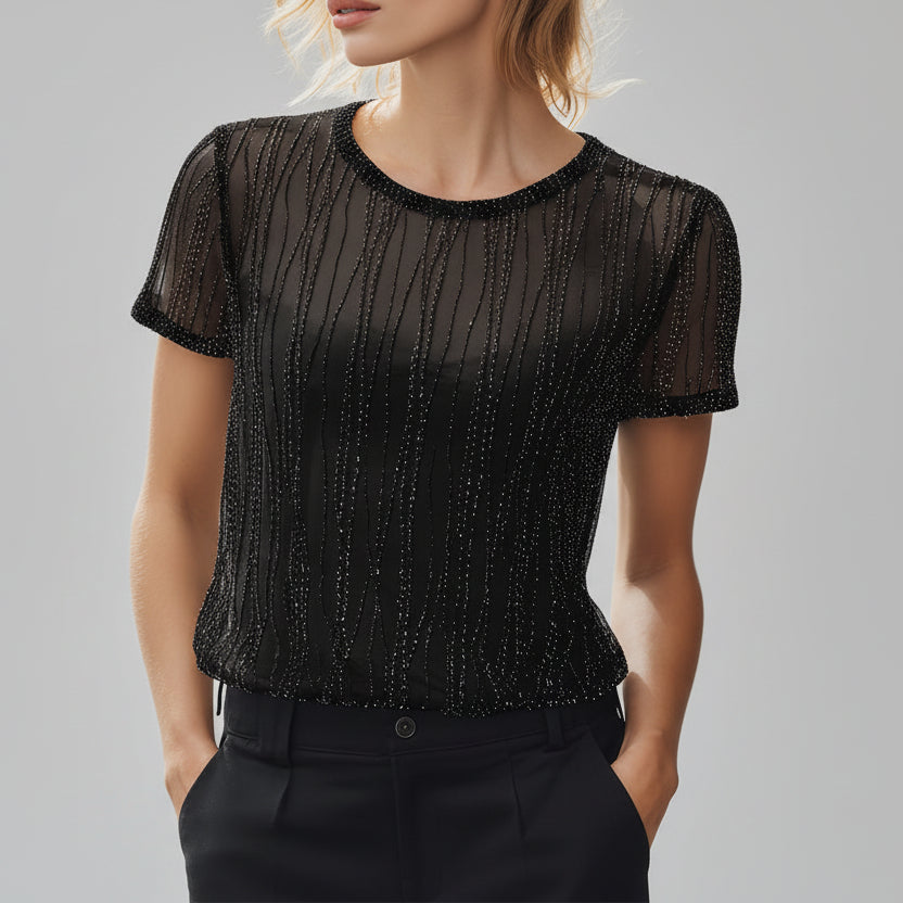 Top de malla negra semitransparente