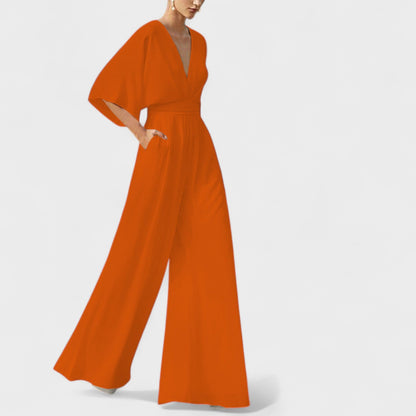 Mono elegante fluido con pantalón amplio