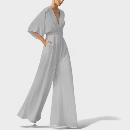 Mono elegante fluido con pantalón amplio