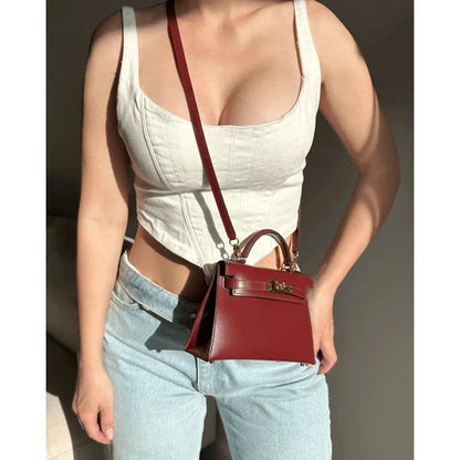 Bolso estructurado de mano con solapa