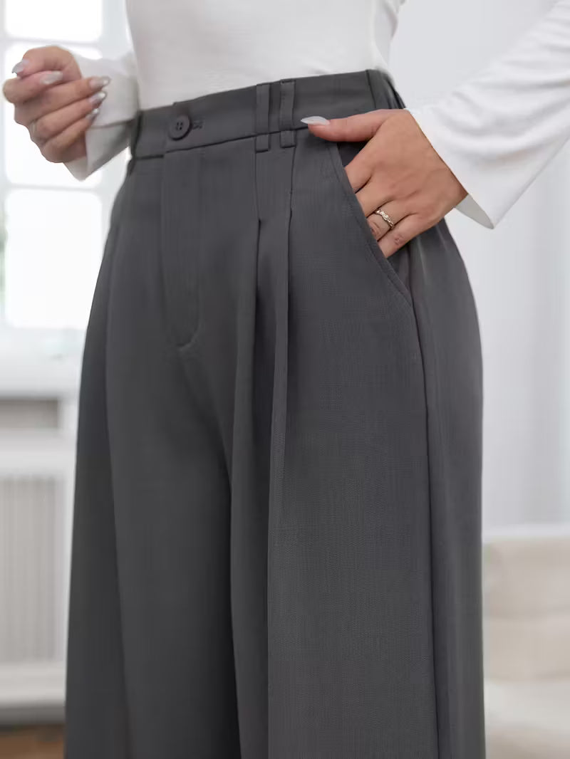 Pantalón de tiro alto con pierna amplia