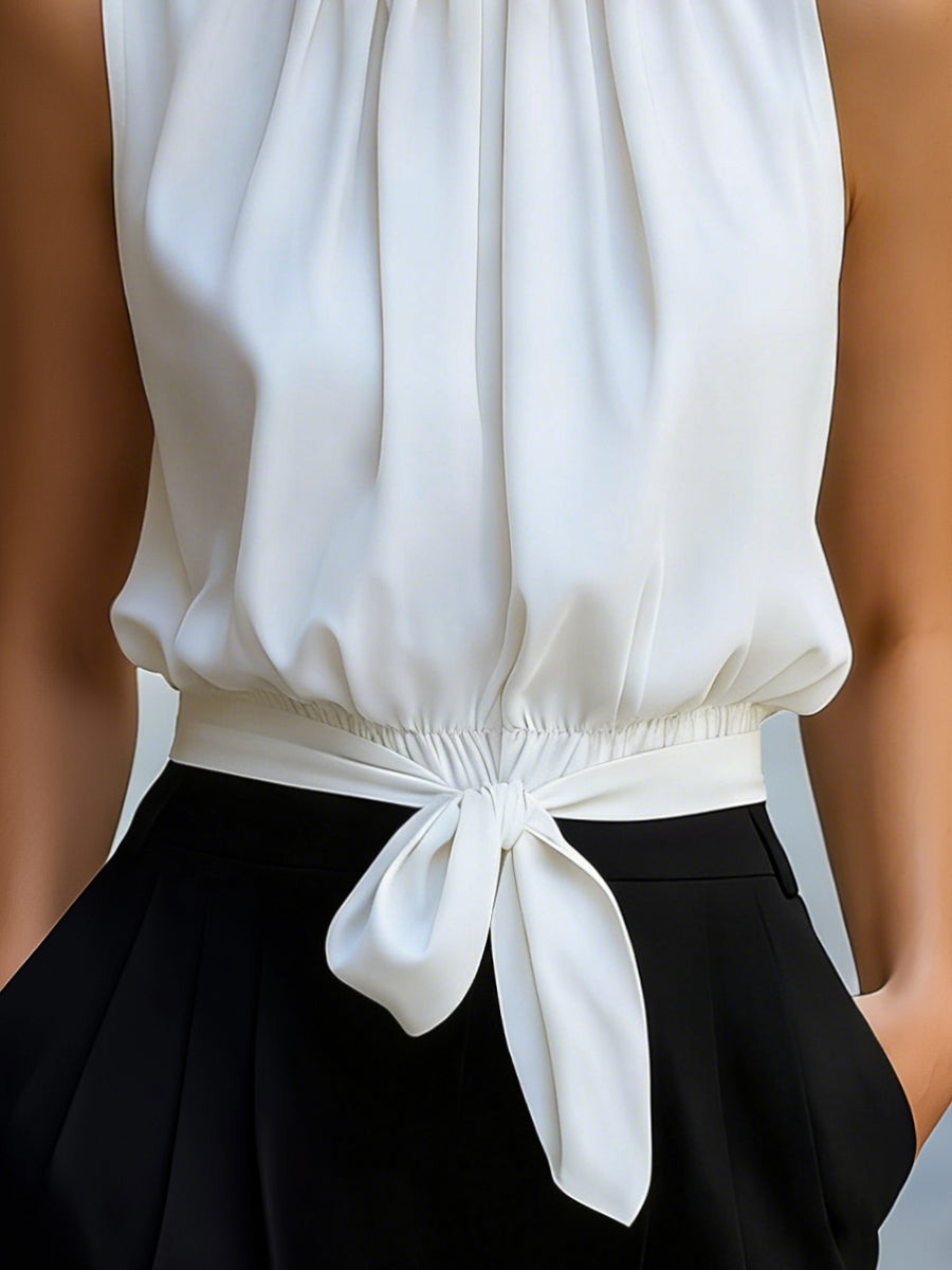 Blusa con cuello alto y lazada