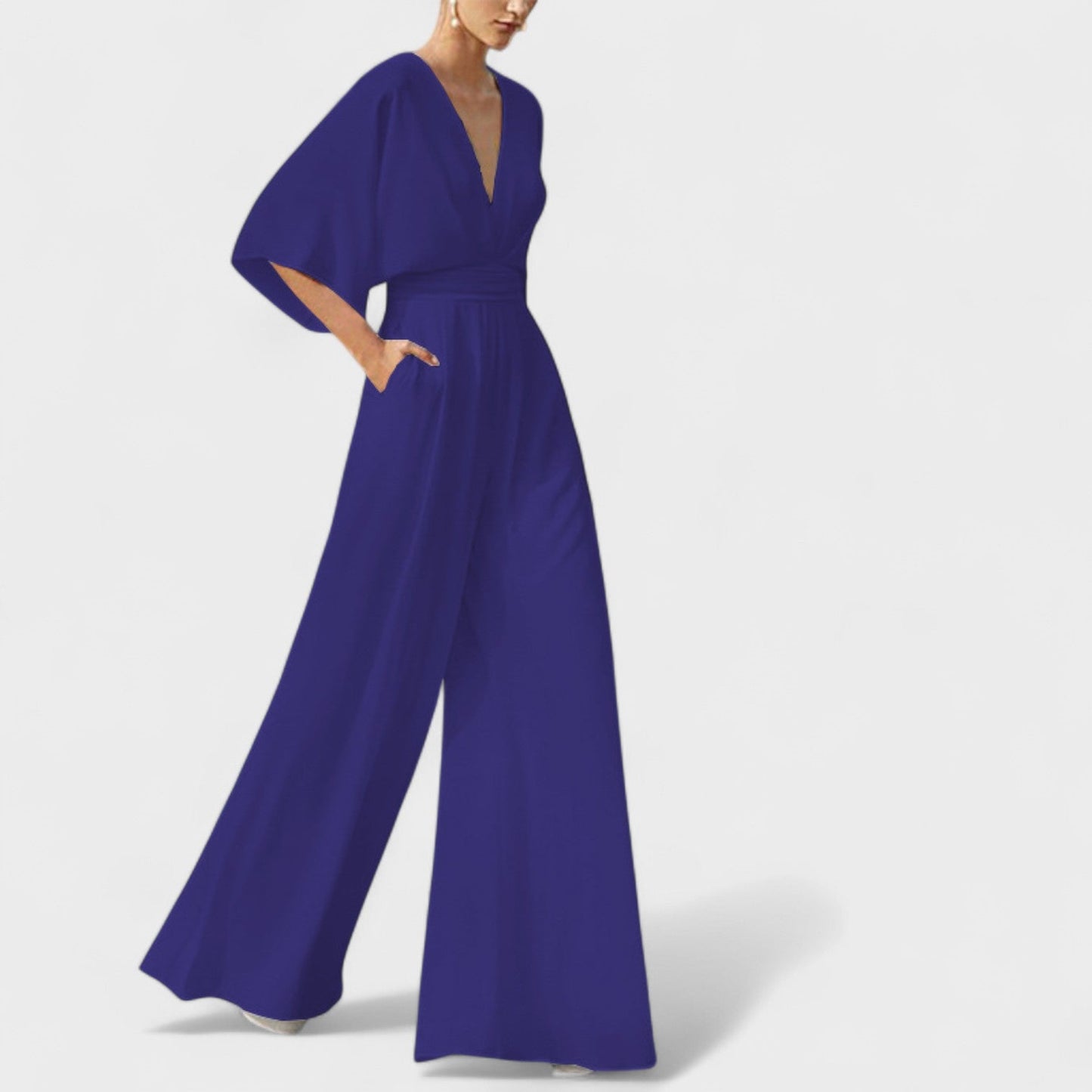 Mono elegante fluido con pantalón amplio