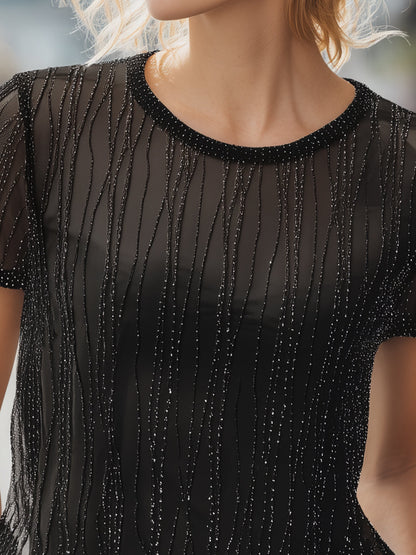 Top de malla negra semitransparente