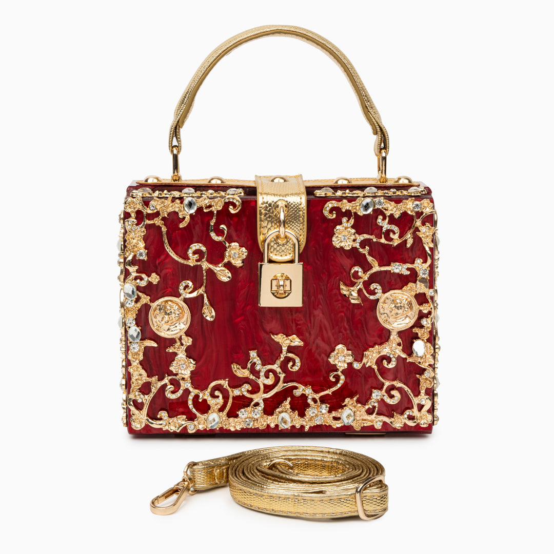 Bolso rígido tipo box con detalles florales