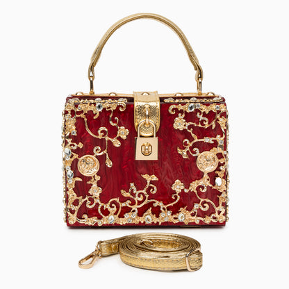 Bolso rígido tipo box con detalles florales