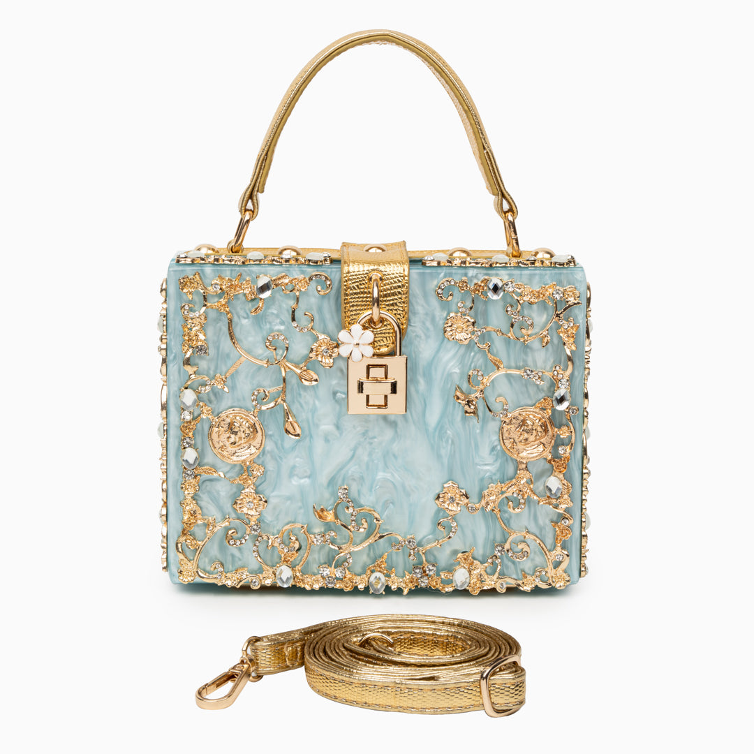 Bolso rígido tipo box con detalles florales