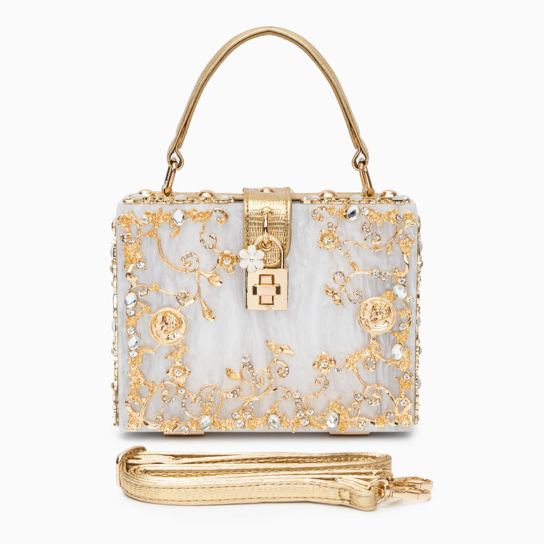 Bolso rígido tipo box con detalles florales