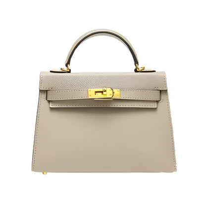 Bolso estructurado de mano con solapa