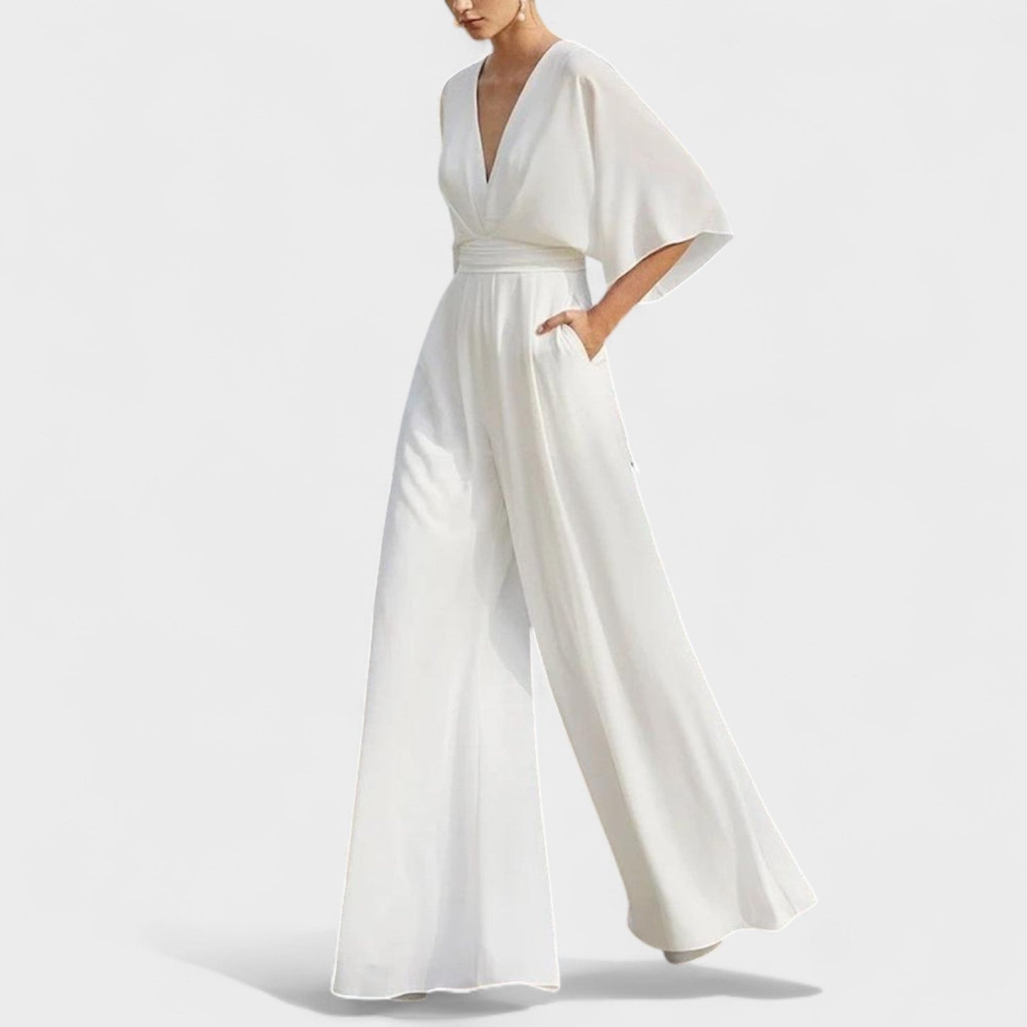 Mono elegante fluido con pantalón amplio