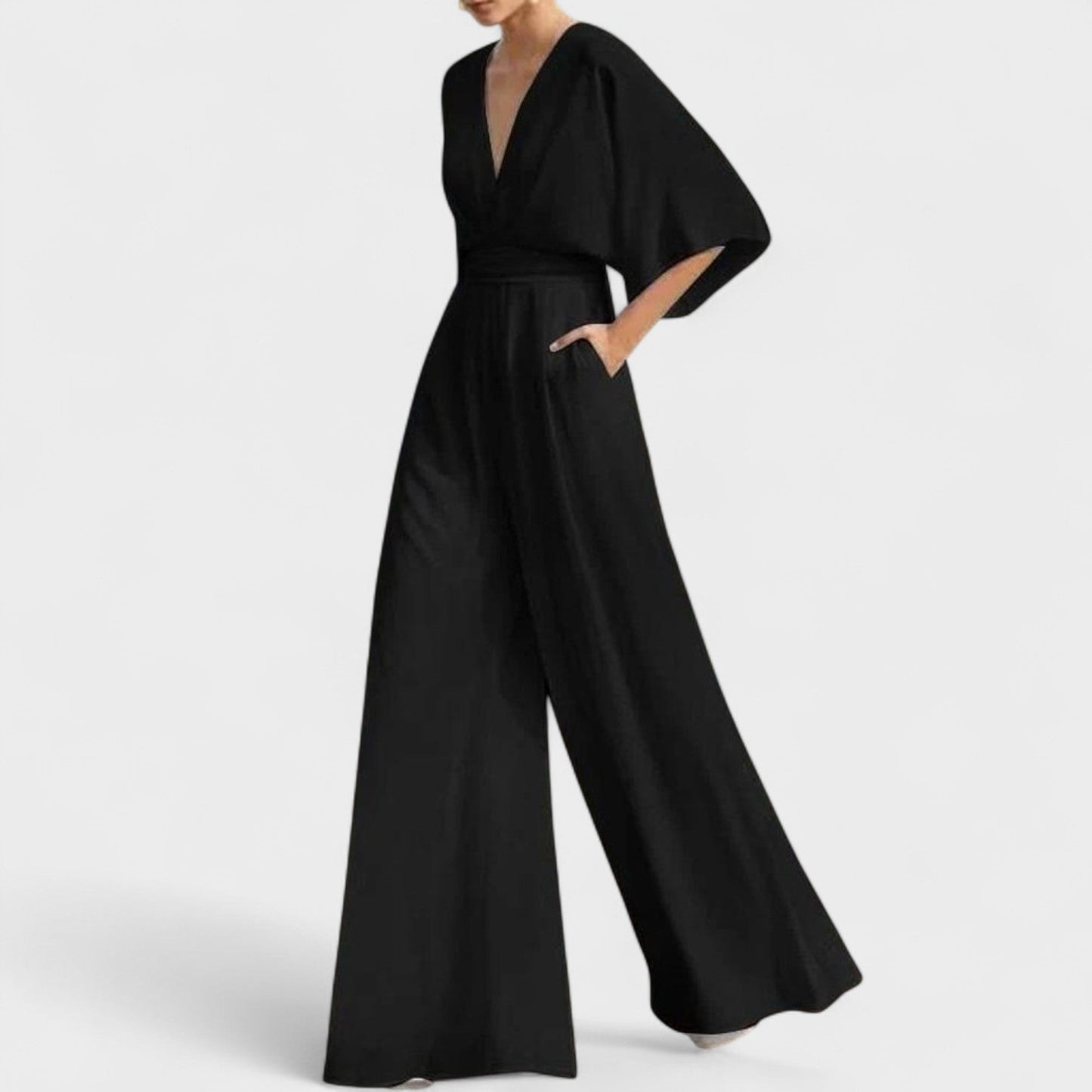 Mono elegante fluido con pantalón amplio