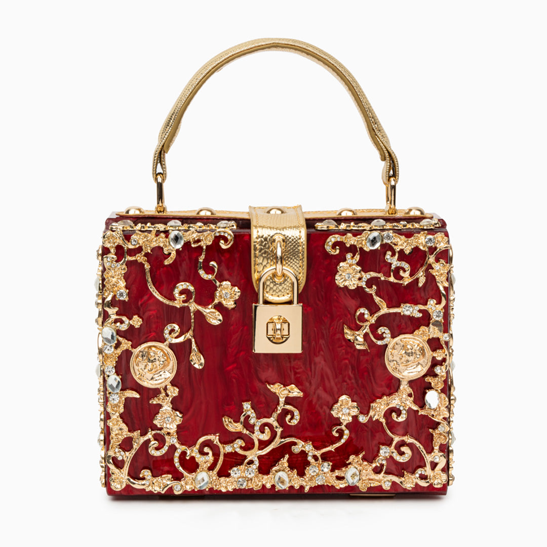 Bolso rígido tipo box con detalles florales