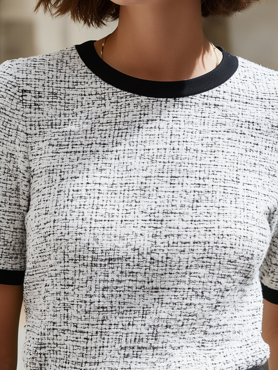 Top bouclé marfil con ribetes en contraste